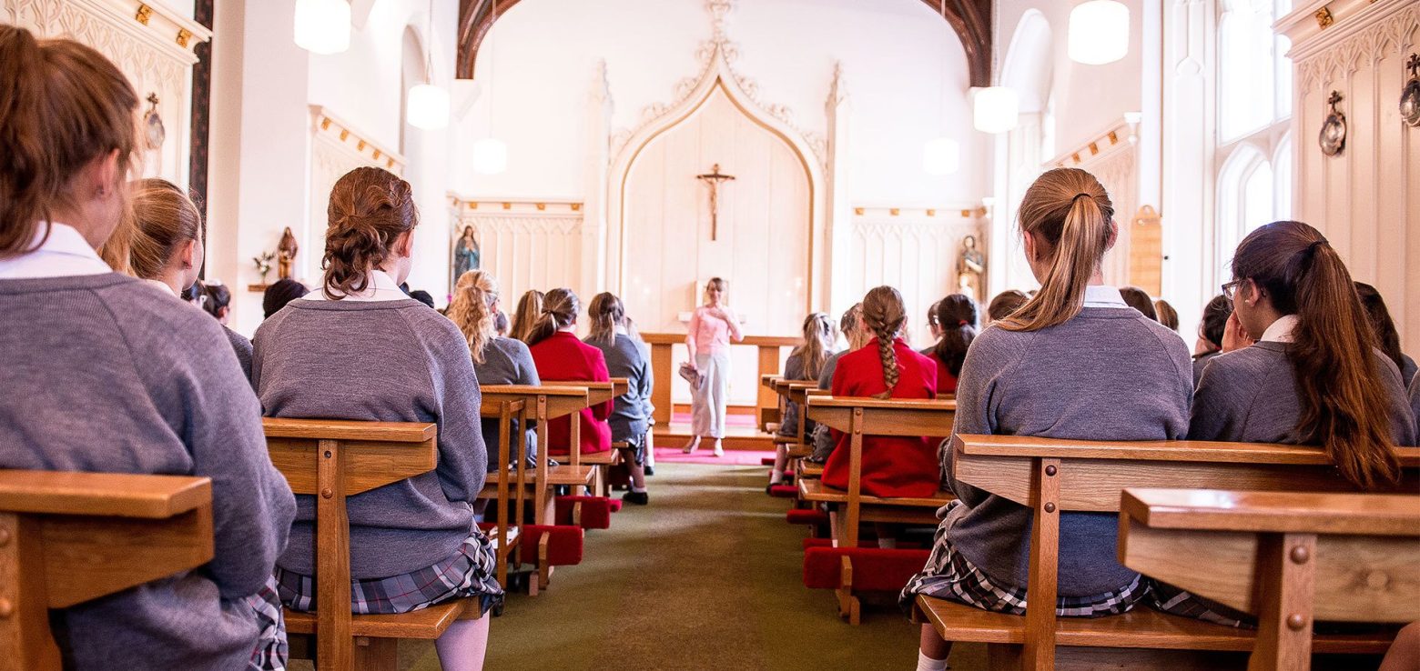 girls sat in the chapel