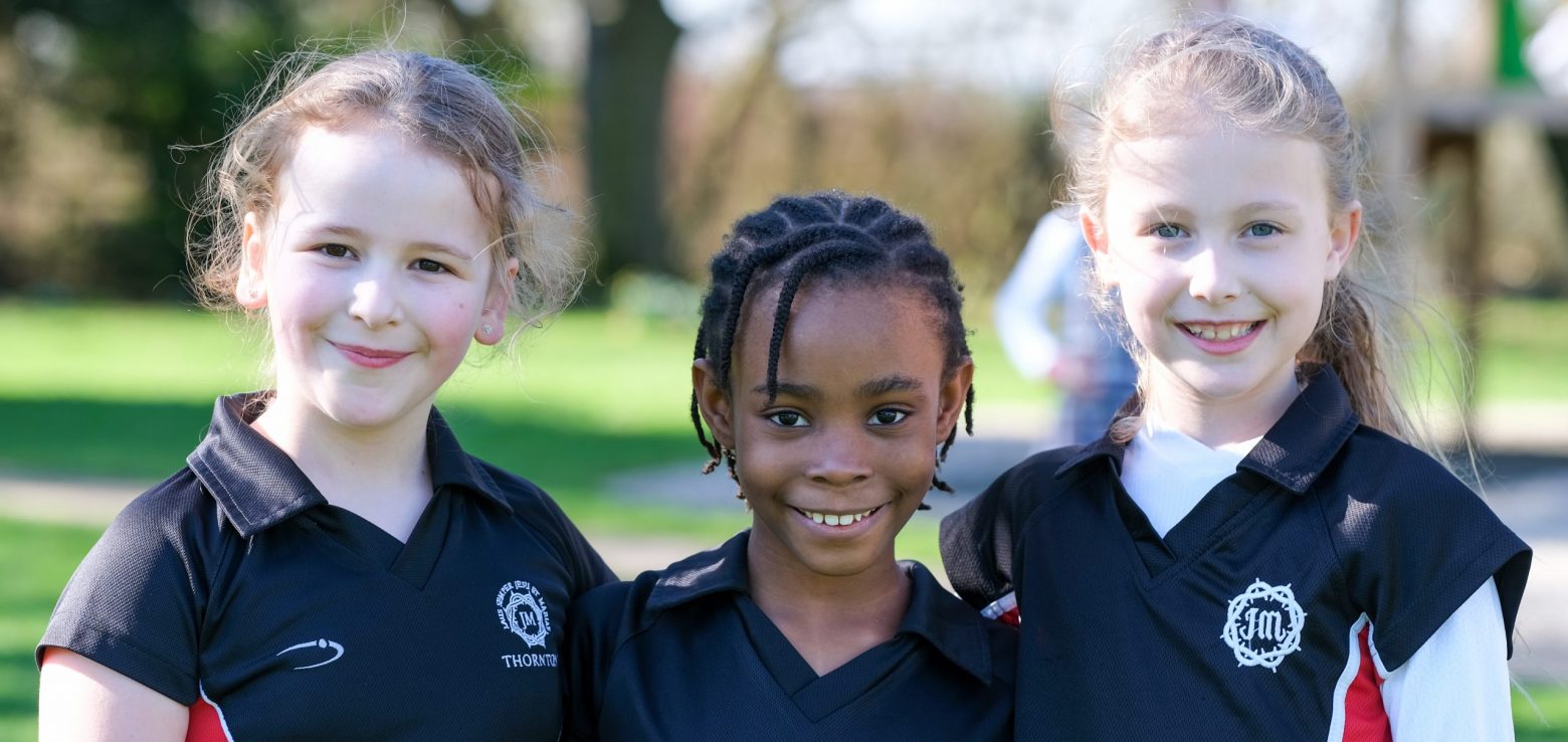 3 girls in sport kit