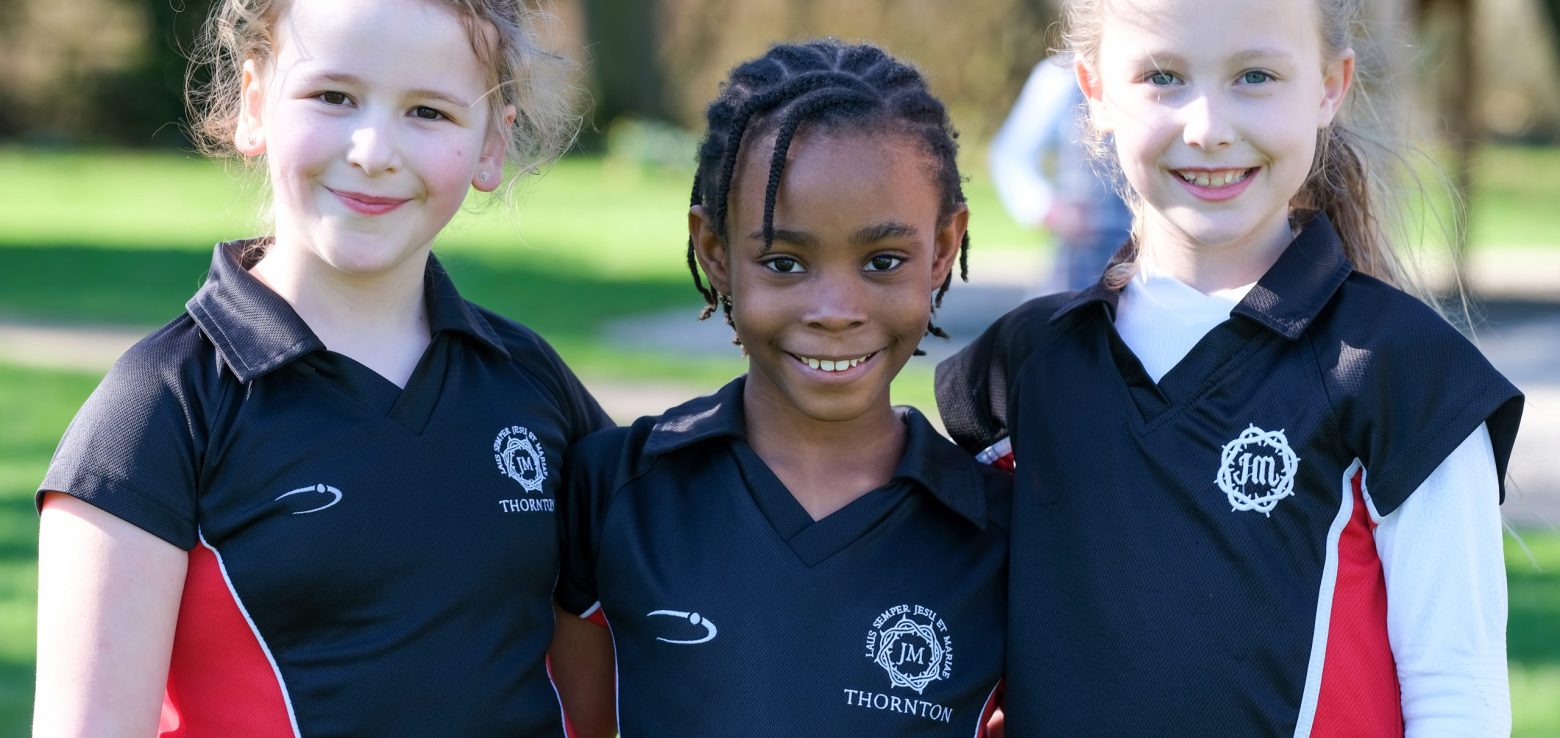 3 girls in sport kit