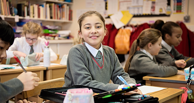 smiling girl in the classroom