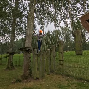 child on a rope bridge