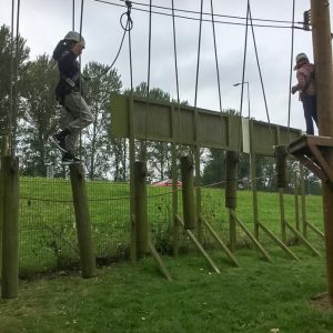 girl on a rope bridge