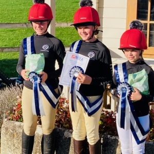 children with their equestrian awards