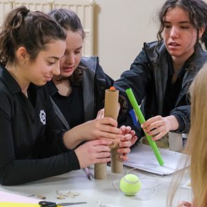 children building a model