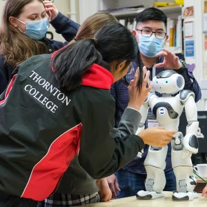 children with a robot