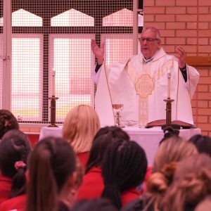 Bishop praying