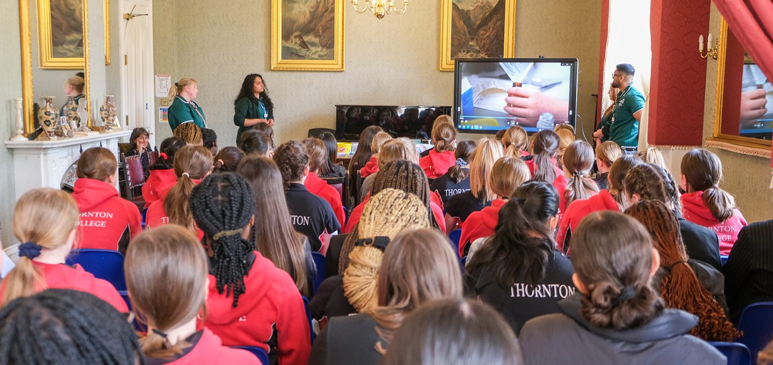 Students listening to a talk