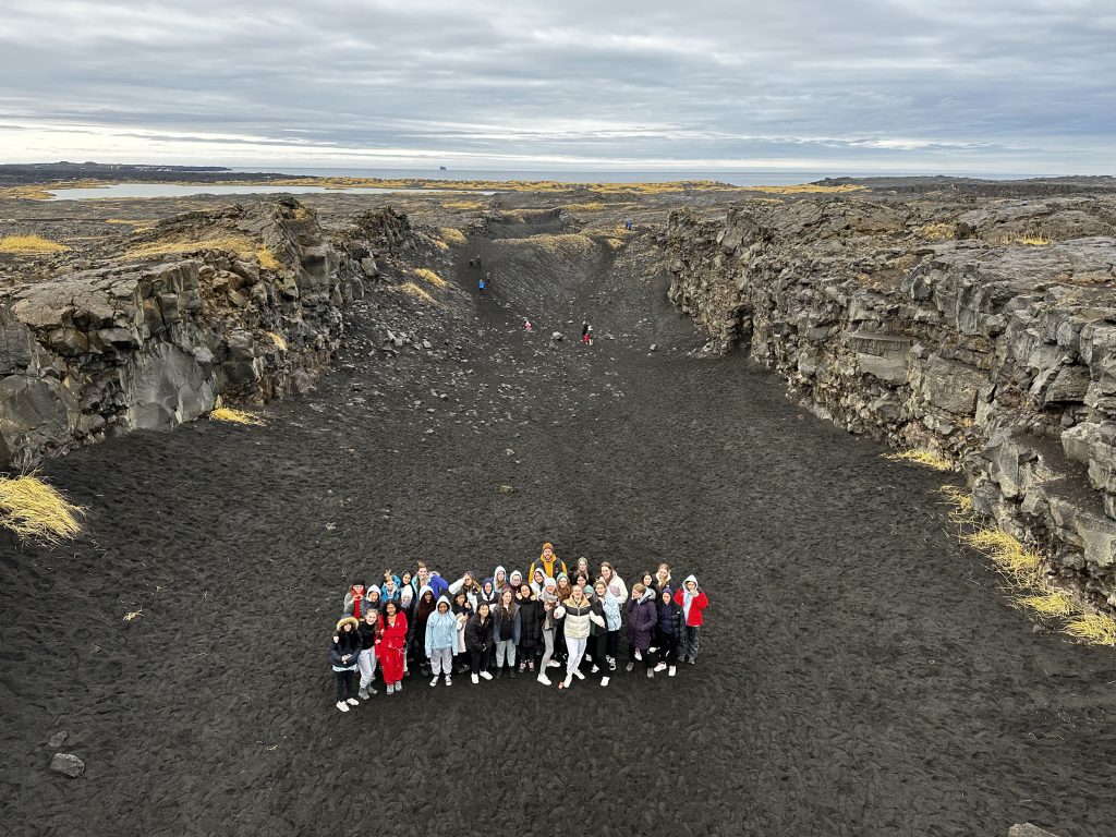 group of students at a mountain site