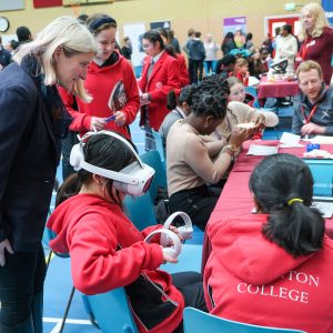 children wearing VR headsets