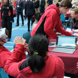 children wearing VR headsets