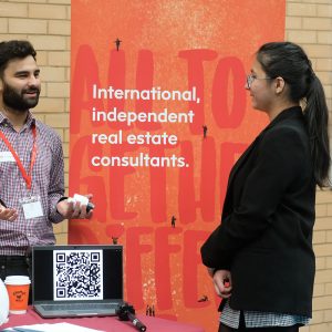 Adults talking at the careers fair