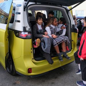 girls sat in a car