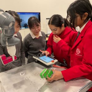 girls experimenting with robotics