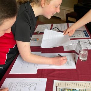 children completing forms