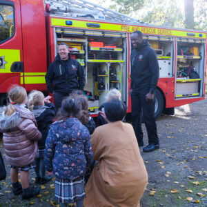 firemen with children