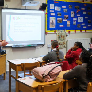 students listening to their teacher