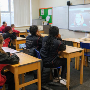 students watching a talk on careers