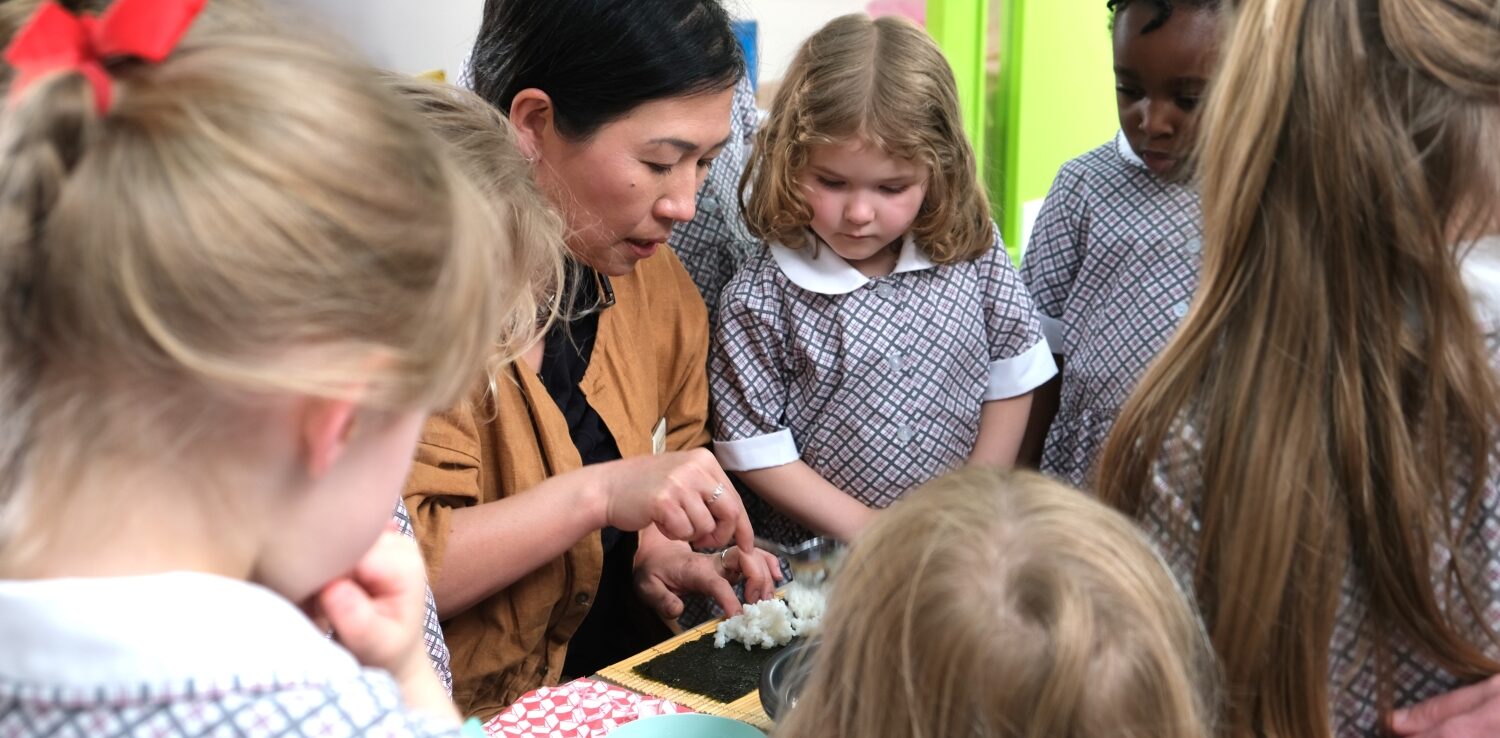 students making sushi