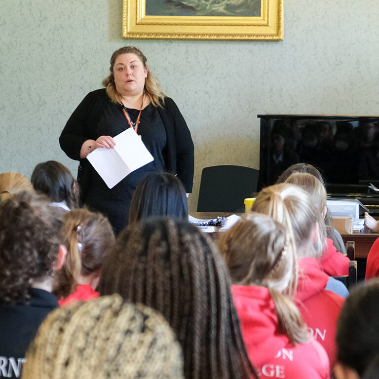 A speaker talks to the room