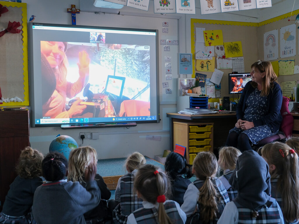 students watching a video in class