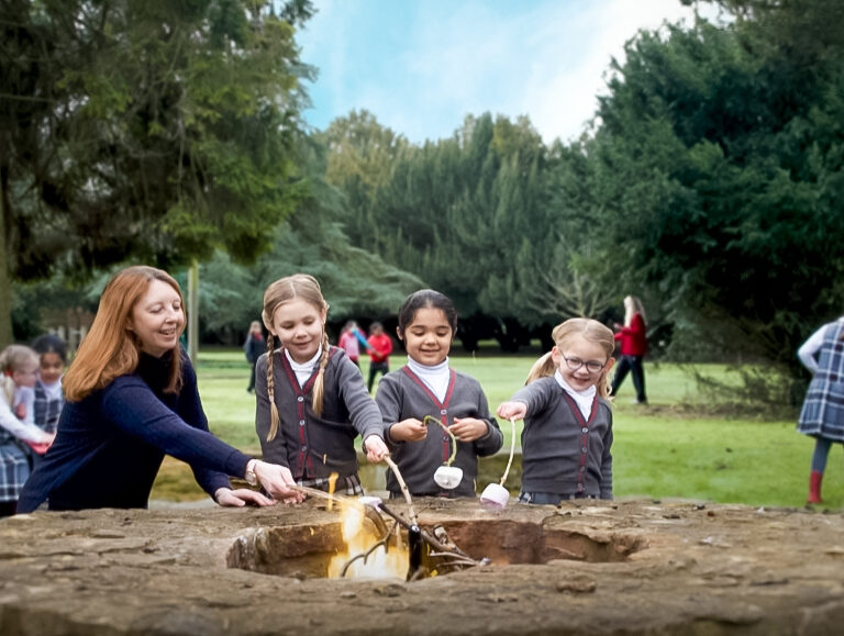pupils toasting marshmallows